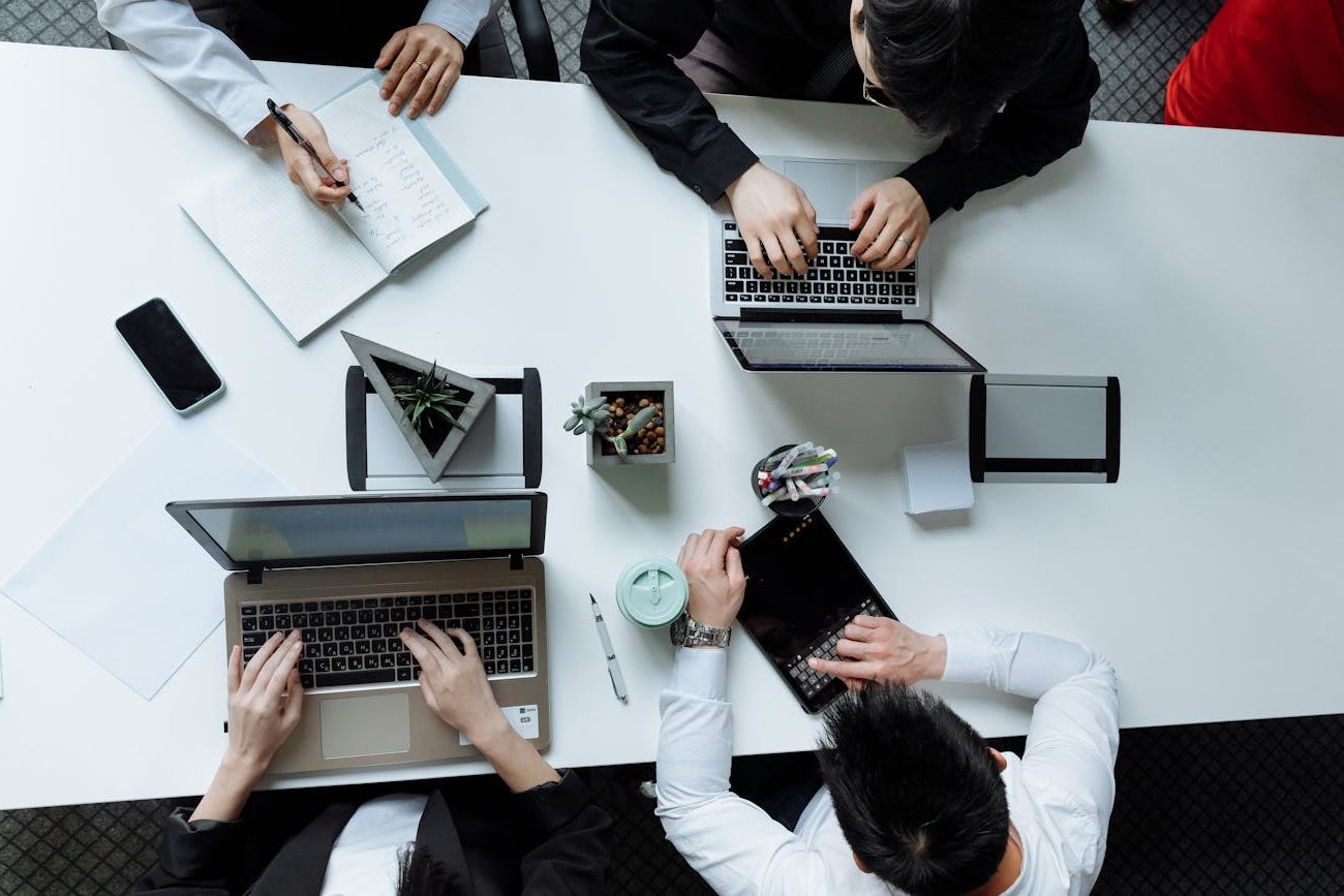 overhead shot of a group of people having a meeting